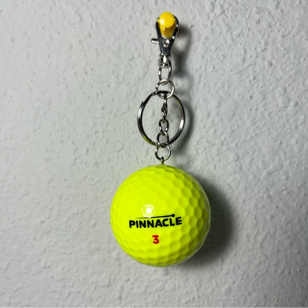 Pinnacle Yellow Golf Ball Keychain with Clasp.